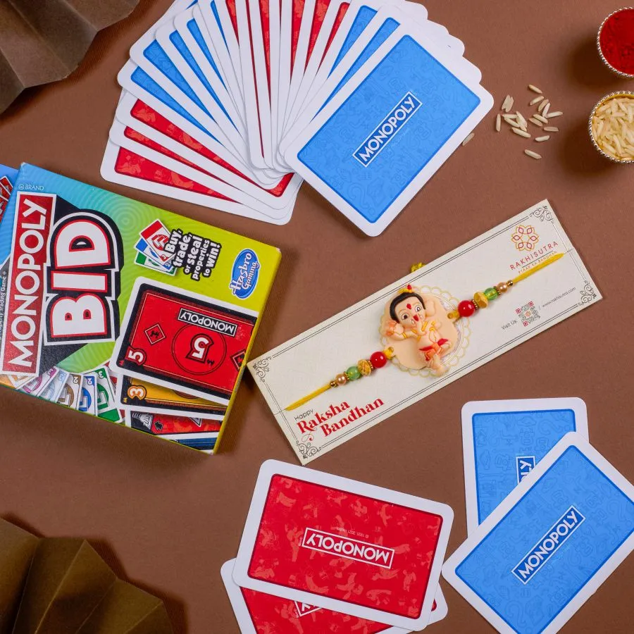 Ganesha Blessings Rakhi With Monopoly Card Game 1