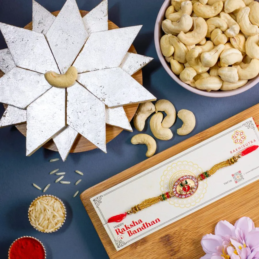 Divine Ganesha Rakhi with Nuts N Sweets Treat 1