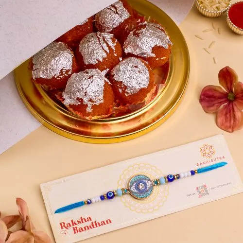 Designer Evil Eye Rakhi N Ghee Laddu Combo