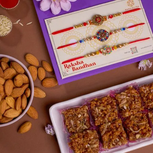 OM and Swastik Rakhi with Sweets 1