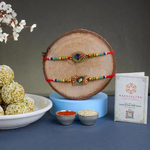 Kundan Rakhi Set & Sweet Laddu Treat