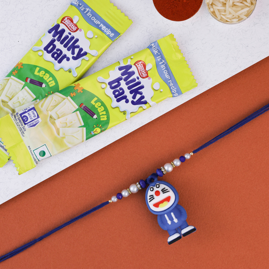 Doremon Rakhi gift pack with chocolate and traditional items 1