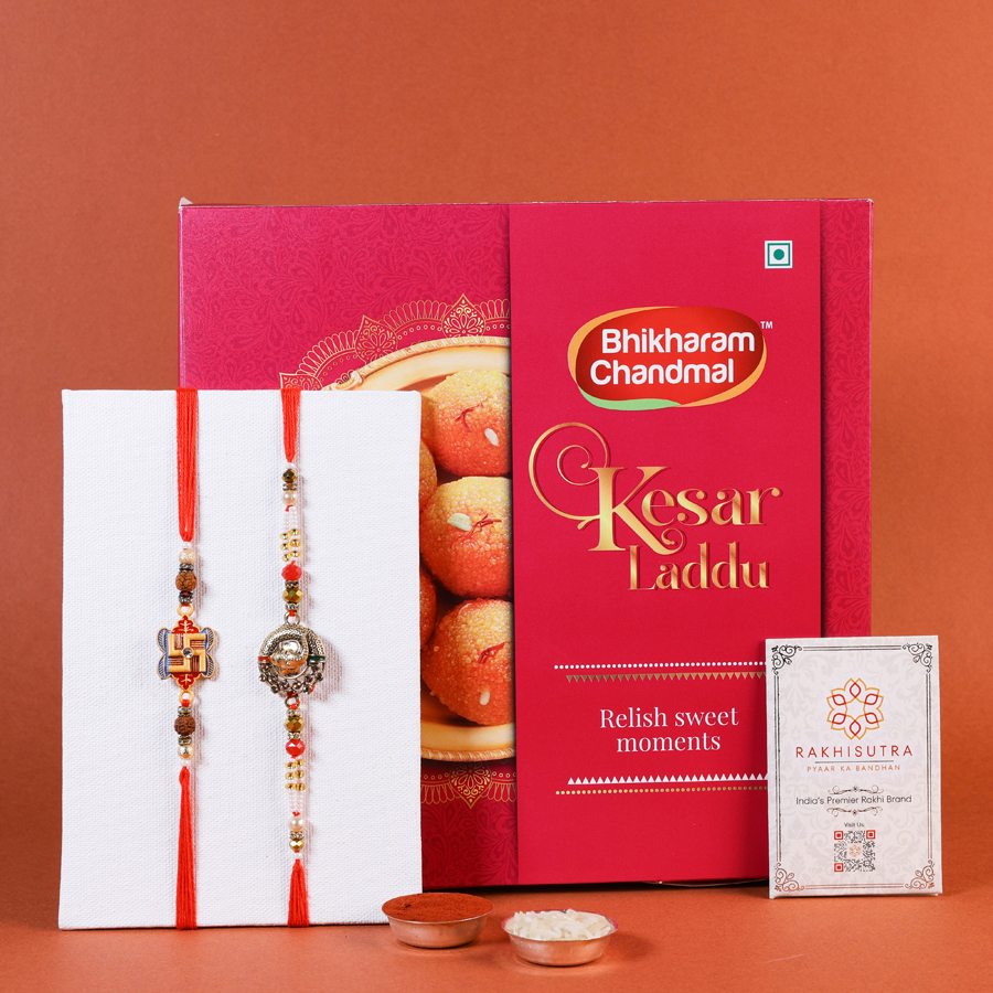 Festive Rakhi gift set with Rakhis, sweets, and a message card 1