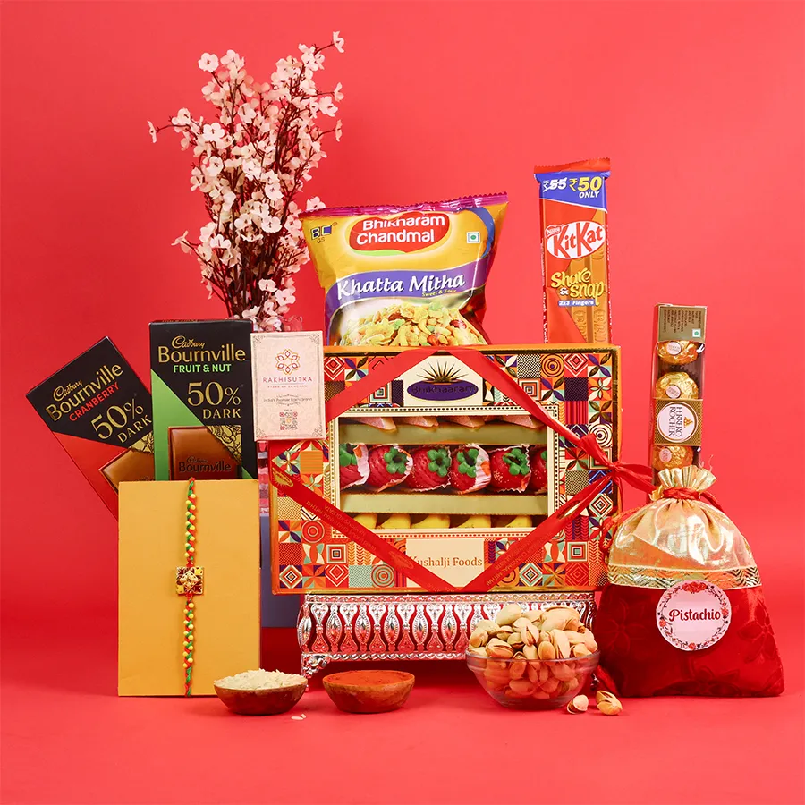 Sweet and savory Rakhi gift box with assorted treats 1