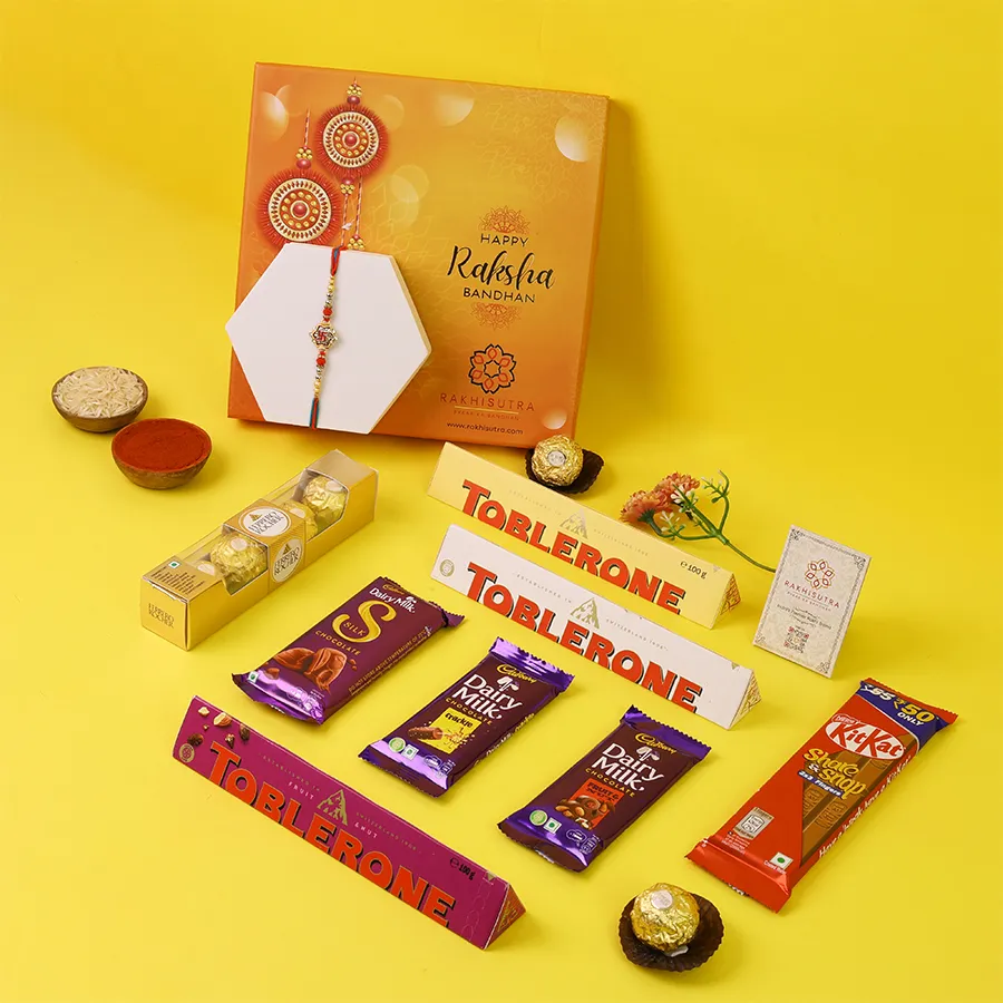 Swastik Rakhi and assorted chocolates in a gift box. 1