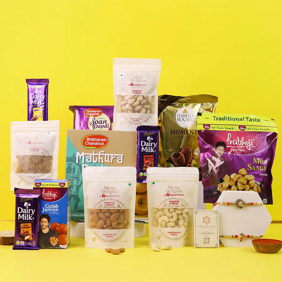Festive Ganesh Rakhi Hamper with chocolates and sweets. 1